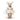 A Steiff teddy bear representing Marilyn Monroe wearing a white pleated dress on a white background
