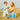 Woman and child by the beach with a clear beach bag containing blue items