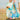 Child holding a clear beach bag with blue straps and toys, standing outdoors.