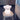 Cute bear-shaped night light on a wooden stool with a blurred background
