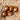 Wooden eggshakers on a brown paper background