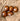 Wooden eggshakers on a brown paper background