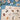 A close up of a puzzle and finder tokens on a blue background