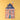 A 36-piece puzzle in a house shaped design on a yellow background