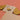 Wooden dog made from the Londji The Fox and The Mouse construction Puzzle on a pink background