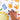 Hand placing a sticker of a blue milk carton with a cow on a white background with various food-themed stickers.