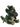 A plush toy dragon in dark green with a lighter beige underbelly and cream-colored claws, sitting against a solid white background.