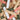 a pile of the Kapla Challenge Wooden Building Planks in the Spring colours