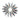 Kapla blocks made into a sunburst design on a white background
