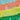 Colorful fringe trim in pink, yellow, and green on a light blue background