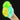 Hand holding three marbled glow in the dark sensory balls in green, yellow, and blue on a black background