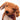 Close-up of a plush dachshund dog toy with a plaid bow tie on a white background