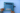 Blue pouch with a visible brand logo held by hands against a light blue background