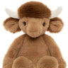 A plush stuffed highland cow, with a brown furry body, darker brown mane, large white horns, and black eyes, photographed on a plain white background.