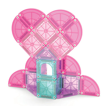Magna Tiles creation of a pink heart building against a white background 