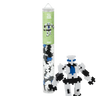 A tube of plastic bricks that makes a white robot