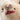 Close-up detail of the mouth of a Marilyn monroe inspired teddy bear. 