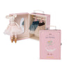 Pink toy box with a ballerina mouse and dress outfits on a white background