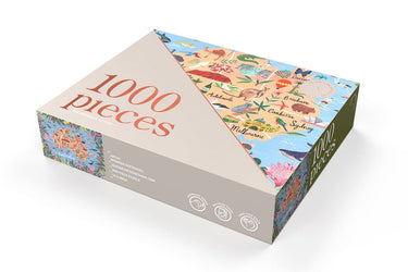 Jigsaw puzzle box with '1000 pieces' text and colorful design on a white background