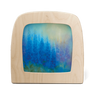 Wooden table lamp with a colorful nature scene inside on a white background