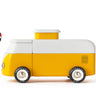 A wooden Volkswagen inspired Camper pop-top in white and yellow on a white background with a magnet symbol. 