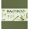 Green notebook with 'Bamboo' branding and a pencil on a white background
