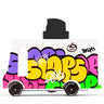 A toy car of a graffiti-covered food truck with a black spray can nozzle on top, featuring bold yellow, pink, purple, and green graffiti lettering on a white body, set against a plain white background.