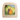 A wooden Toverlux lamp with rounded corners and a clear front window, showcasing a handcrafted felted wool art piece of a gray bunny next to an orange Easter egg on a green hill under a blue sky.