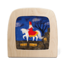 A wooden Toverlux frame featuring a wool illustration of Saint Nicholas on a white horse against a dark blue sky and black tree silhouette.