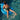 Child on a blue inflatable hippo float in a pool