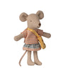 Stuffed mouse toy with a striped dress and yellow backpack on a white background