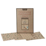 A package of Mouse Hole Farmhouse Annex nursery stickers by Mark & Lili, featuring a kraft paper style box with illustrations of a crib and bedding, with three patterned sticker sheets displayed in front on a white background.