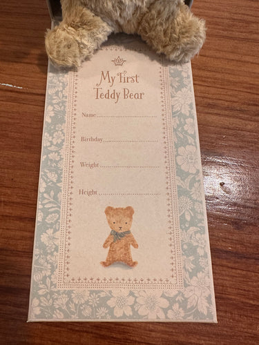 Part of the box flips down so you can write a child's name, birthday, weight and height. 