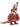 Plush toy owl with decorative headpiece on a white background