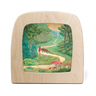 Wooden Toverlux lamp with a painted scene of a forest path, Red Riding Hood and the wolf walking along a forest path with trees and mushrooms in the background. 