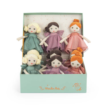 A set of Moulins Roty Les Fees fabric dolls in pastel-colored dresses, presented inside their mint green gift box on a white background.