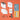 Collection of 'Villages' themed stationery items on an orange background, including stamps, a workbook and coloured stamp pads. 