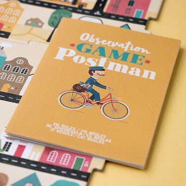 A close up of the boardgame Postman on a yellow background