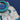A close-up of a vintage-style paper kaeledoscope on a blue background featuring a space-themed design with a circular teal kaeledoscope, set against a dark blue textured background.