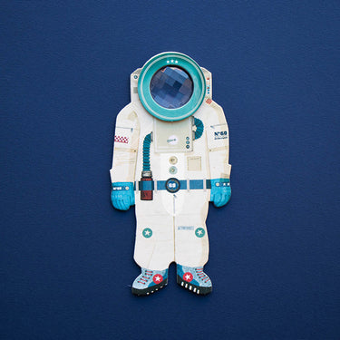 An astronaut shaped compound kaeledoscope on a blue background