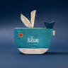 A puzzle called Blue in a whale shaped box on a blue background