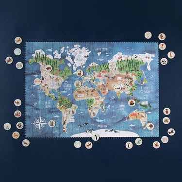 A 200-piece world map puzzle with small circular dots you use to located landmarks on a blue background