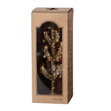 Cardboard box with a decorative Christmas tree inside on a white background