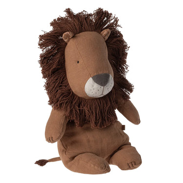 Stuffed lion toy with brown fur and a white muzzle on a white background