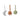 Three Ferm Living soft fabric hanging toys on a white background: a pale gray crescent moon, a terracotta starburst, and a sage green oval with small white dots.