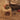 Child playing with Ferm Living building blocks on a carpeted floor