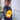 Child holding a lion-shaped night light in a blurred indoor setting