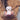 Person holding a small white bear-shaped night light