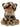 A plush toy of a sabre tooth tiger, with black and tan spots, brown ears and muzzle, white tusks, and a white chest patch, set against a plain white background.