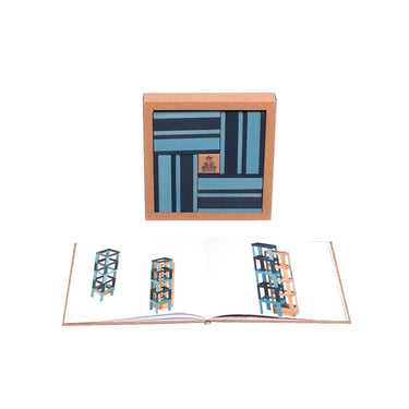 A brown box with name light blue and dark blue planks inside with an open book infront showing designs you can build on a white background
